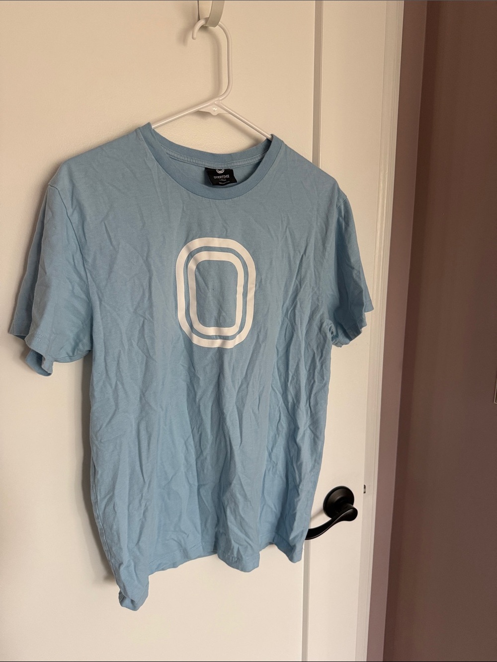 OVERTIME Light Blue Short Sleeve Tee with White Ring Graphic